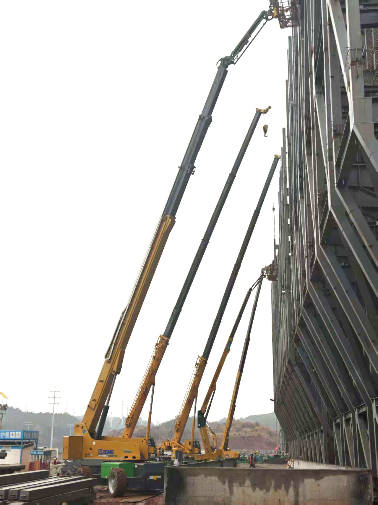 高空协同显实力｜徐工装备助阵银联黄山园区，外立面施工提质增效